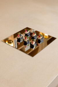 Black bun with tuna & gold